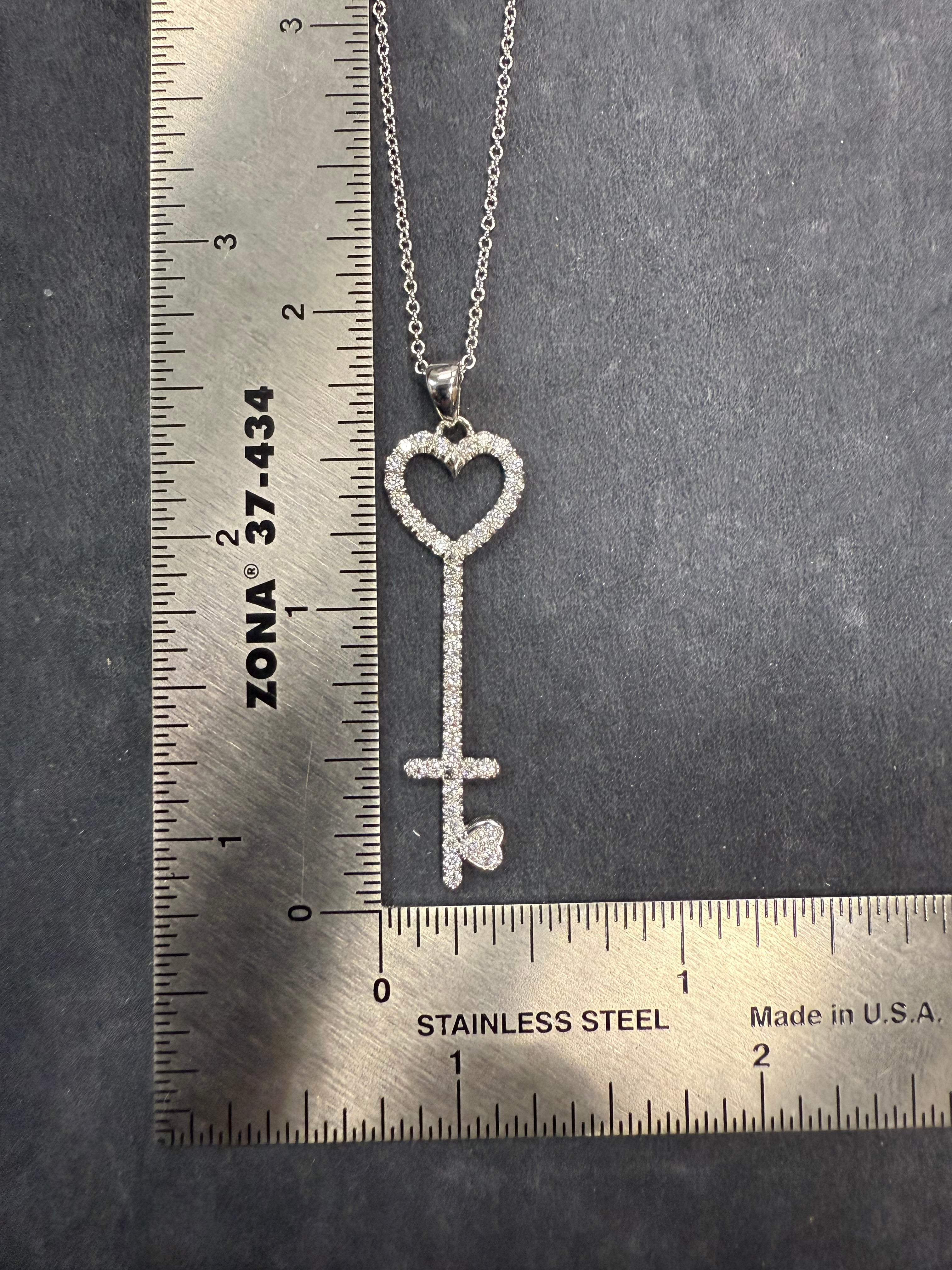 Modern White Gold 0.75 CARAT Natural Round Brilliant Diamond Key Shaped Pendant