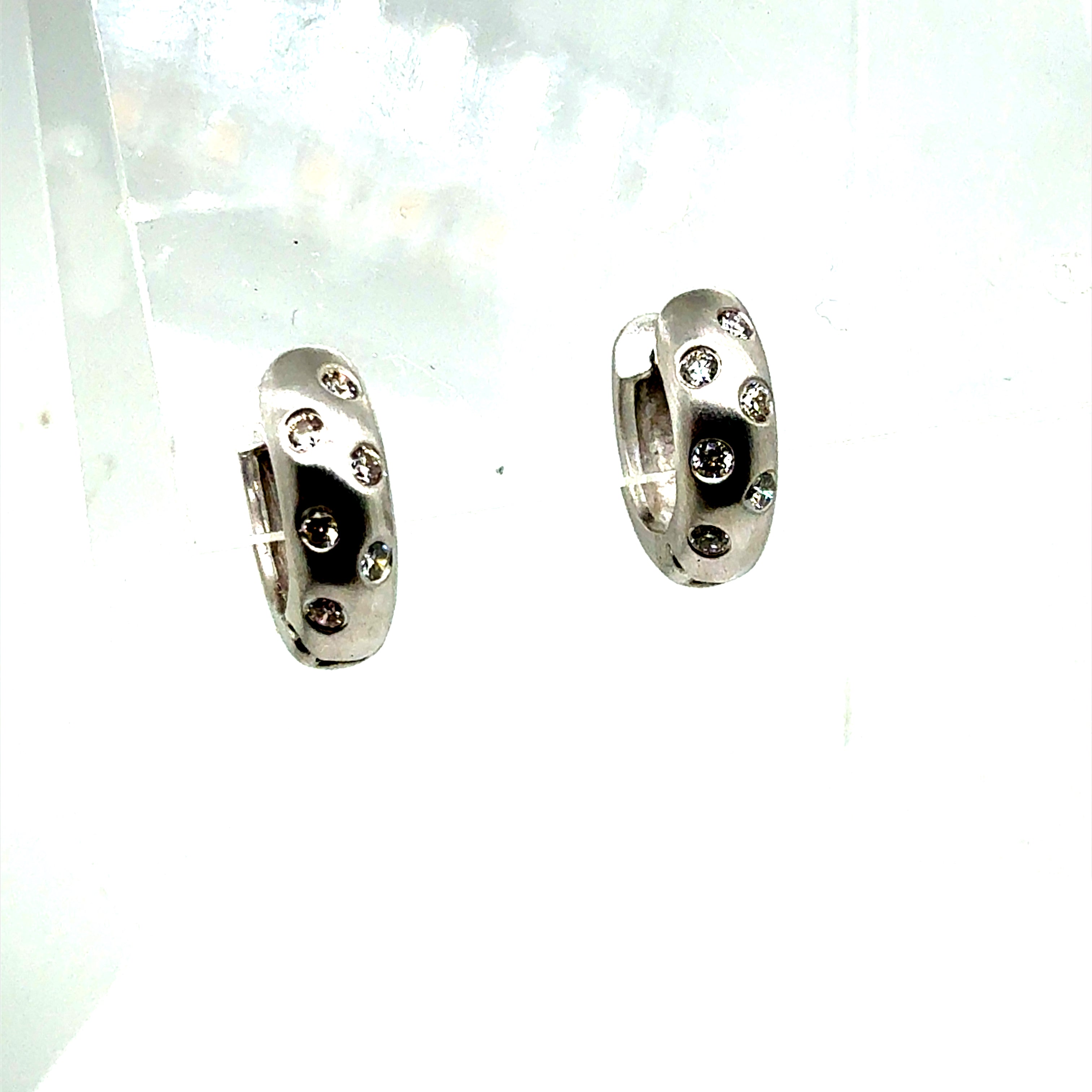 Modern White Gold Satin 0.30 Carat Natural Colorless Diamond Huggie Earrings