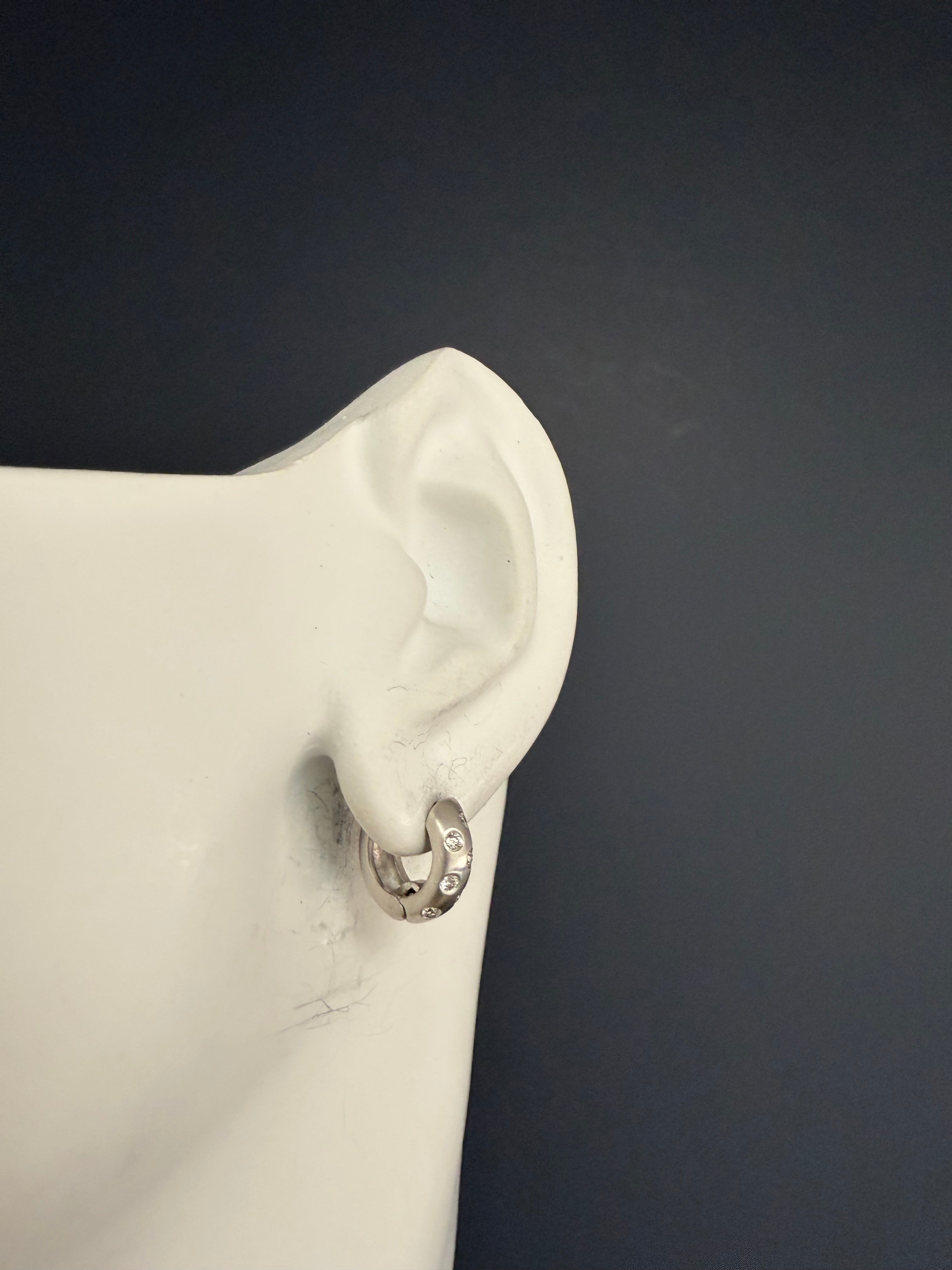 Modern White Gold Satin 0.30 Carat Natural Colorless Diamond Huggie Earrings