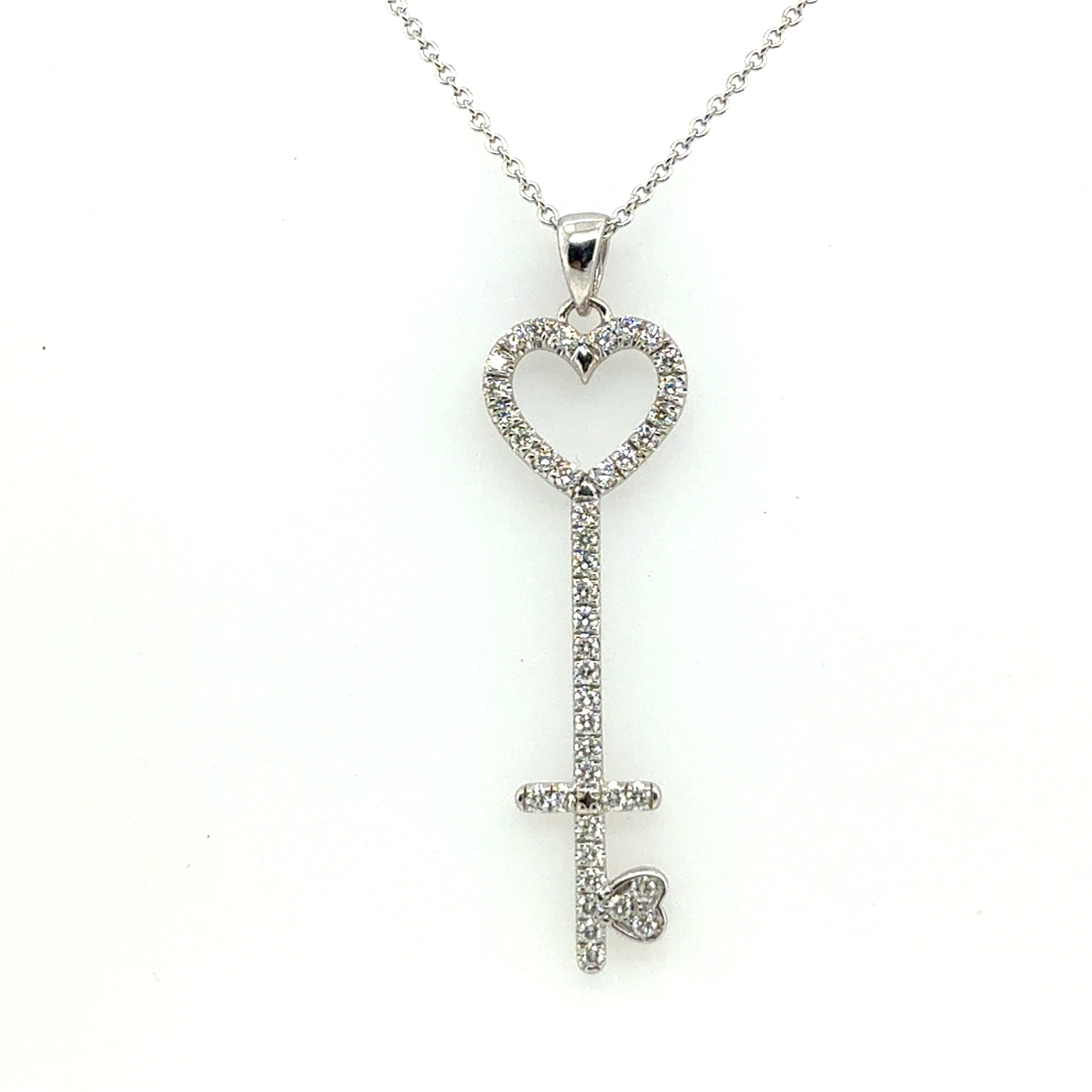 Modern White Gold 0.75 CARAT Natural Round Brilliant Diamond Key Shaped Pendant