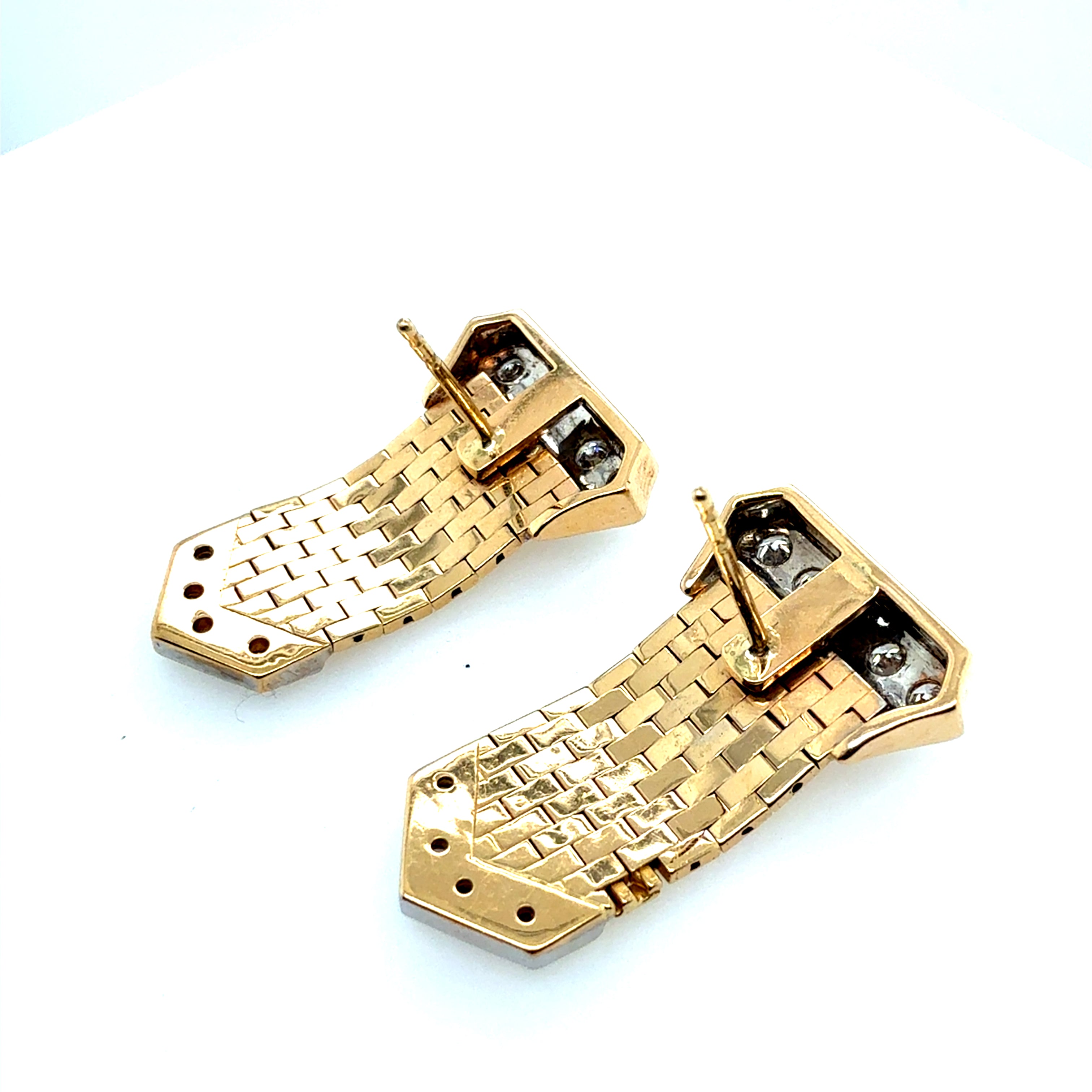 Retro Gold 0.60 Carat Natural Diamond Buckle Earrings Circa 1980