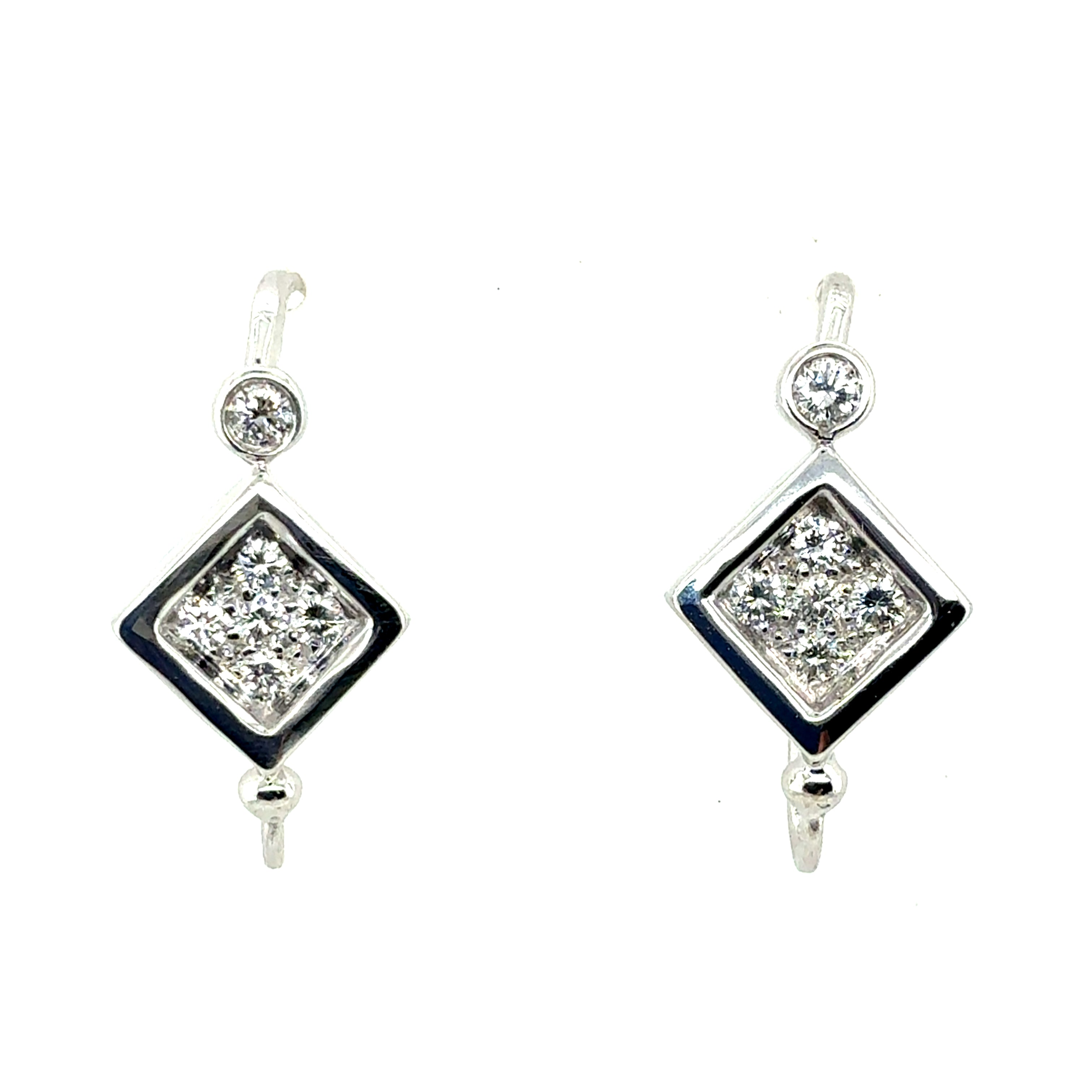 Retro White Gold 0.6 Carat Natural Colorless Diamond Earrings, Circa 1980