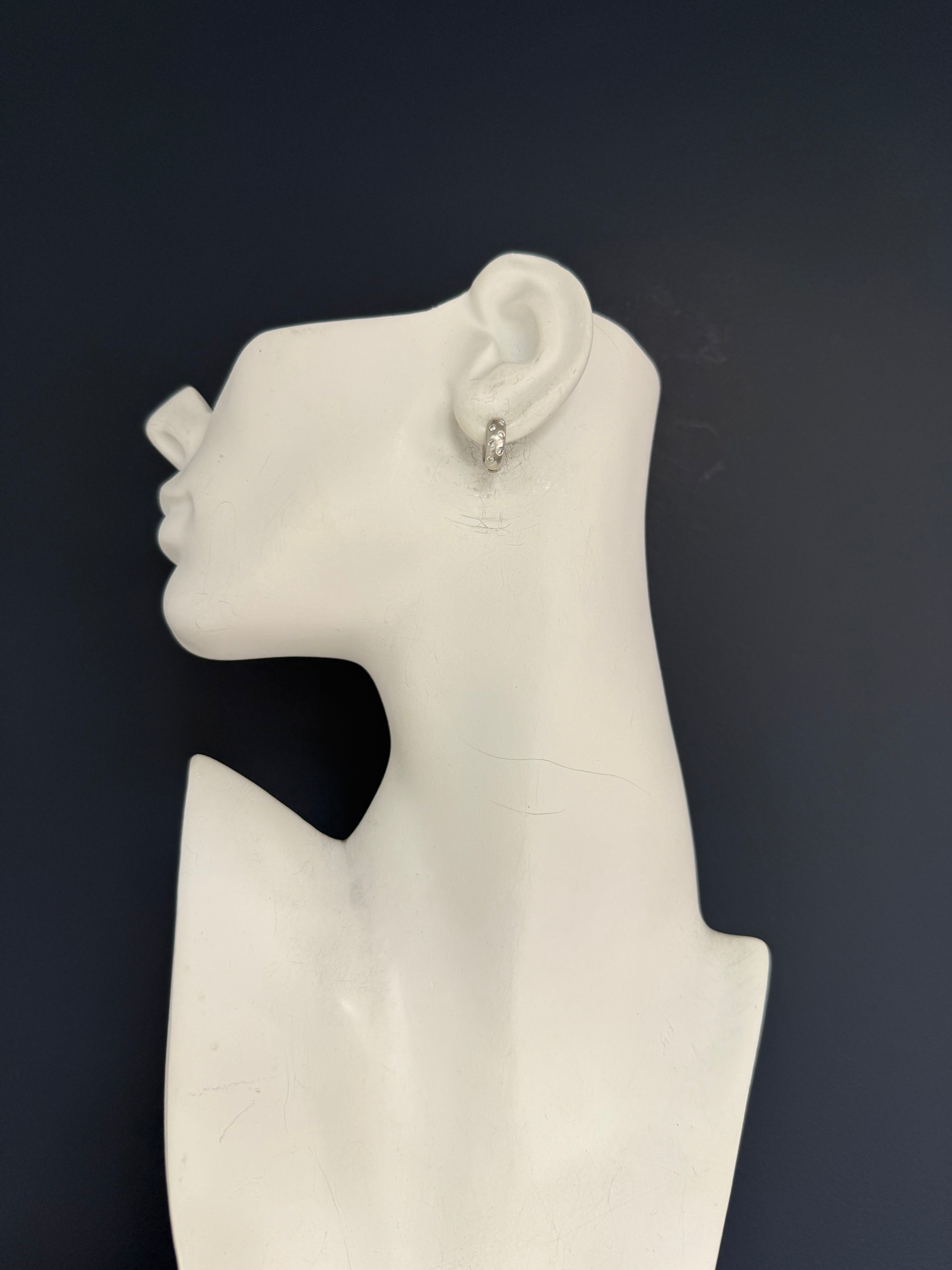 Modern White Gold Satin 0.30 Carat Natural Colorless Diamond Huggie Earrings