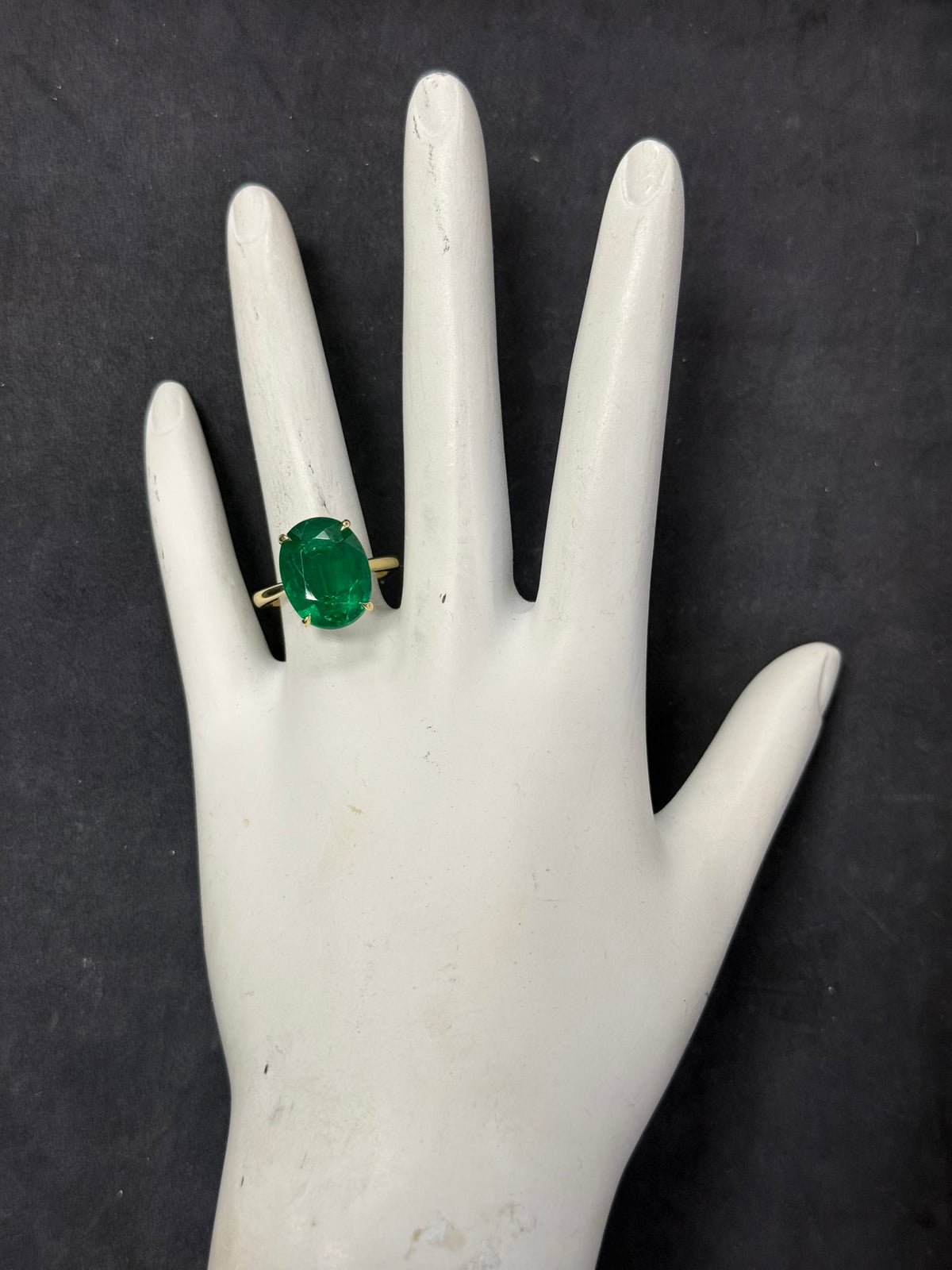 Modern Gold GIA Certified 6.53 Carat Natural Oval Zambian Green Emerald Ring