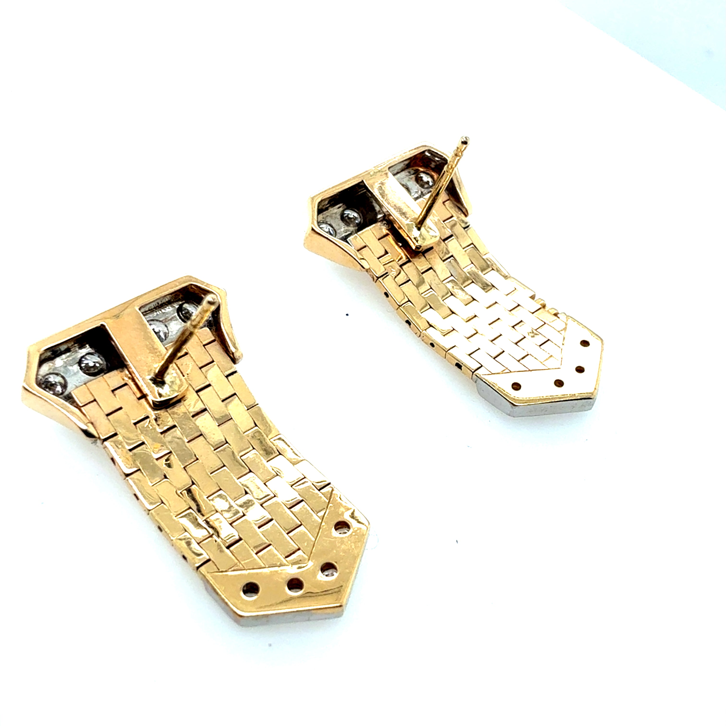 Retro Gold 0.60 Carat Natural Diamond Buckle Earrings Circa 1980