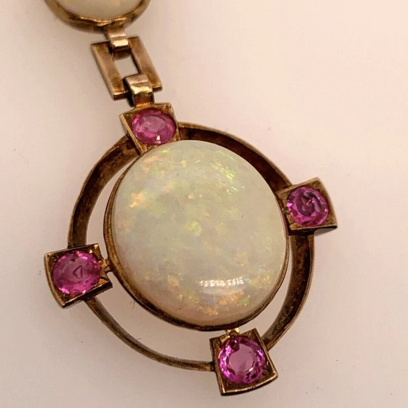 Retro Gold Pendant 10.50 Carat Natural White Cabochon Opal & Ruby Gem Circa 1950