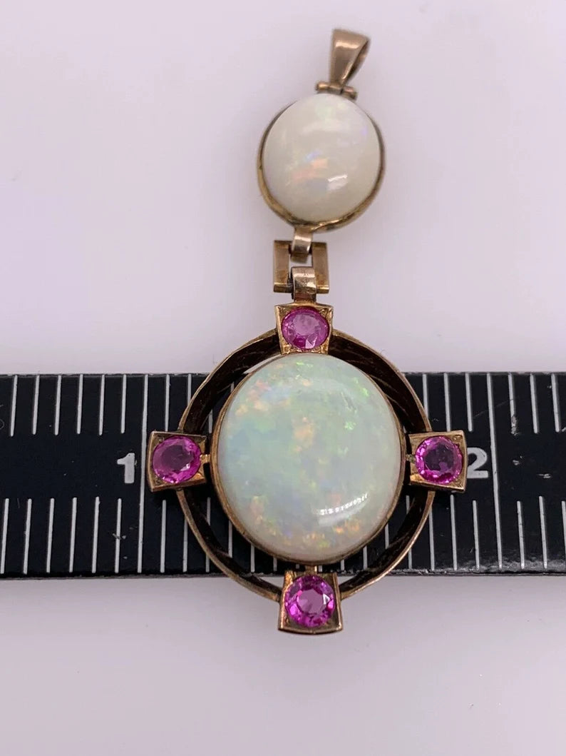 Retro Gold Pendant 10.50 Carat Natural White Cabochon Opal & Ruby Gem Circa 1950