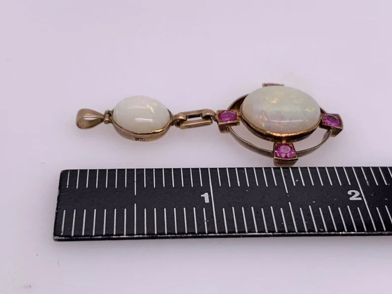 Retro Gold Pendant 10.50 Carat Natural White Cabochon Opal & Ruby Gem Circa 1950