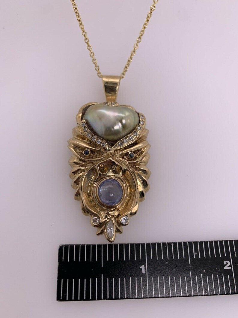 Retro Gold Warrior Head Natural Pearl, .30 Carat Diamond & Sapphire Pendant 1950