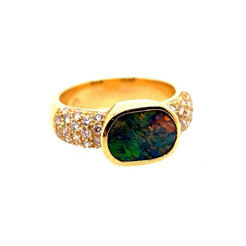 Retro Gold Natural 0.85 Carat Round Diamond and Opal Cocktail Ring Circa 1960