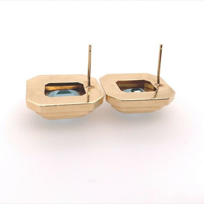 Retro 12 Carat Gold Natural Emerald Cut Blue Topaz Gem Stone Earrings Circa 1970