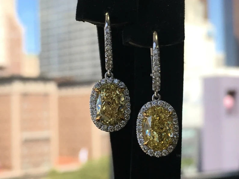 Modern 3.09 Carat Platinum GIA Certified Natural Intense Yellow Diamond Earrings