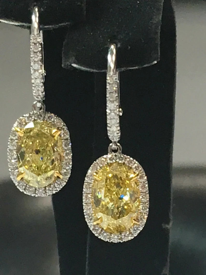 Modern 3.09 Carat Platinum GIA Certified Natural Intense Yellow Diamond Earrings