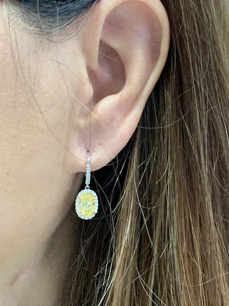 Modern 3.09 Carat Platinum GIA Certified Natural Intense Yellow Diamond Earrings