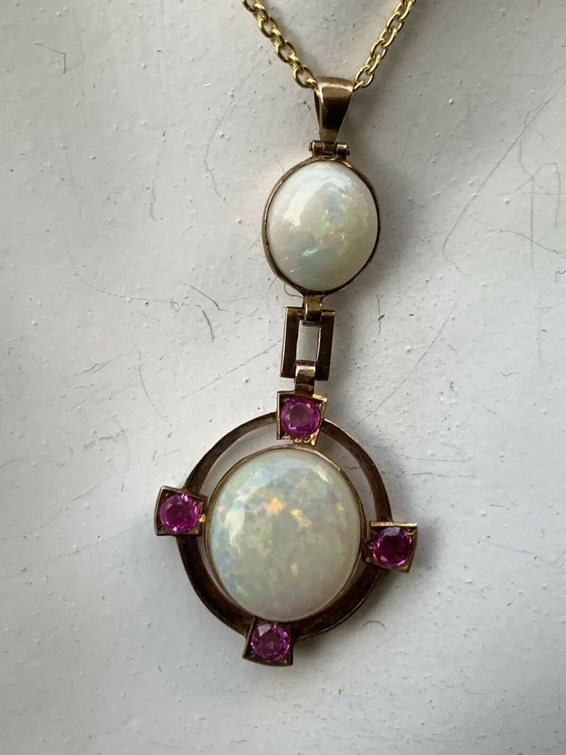 Retro Gold Pendant 10.50 Carat Natural White Cabochon Opal & Ruby Gem Circa 1950