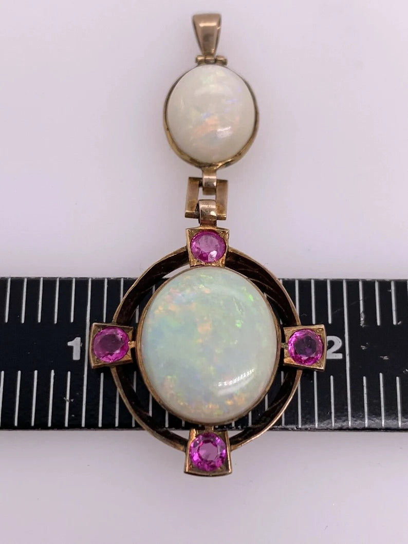 Retro Gold Pendant 10.50 Carat Natural White Cabochon Opal & Ruby Gem Circa 1950