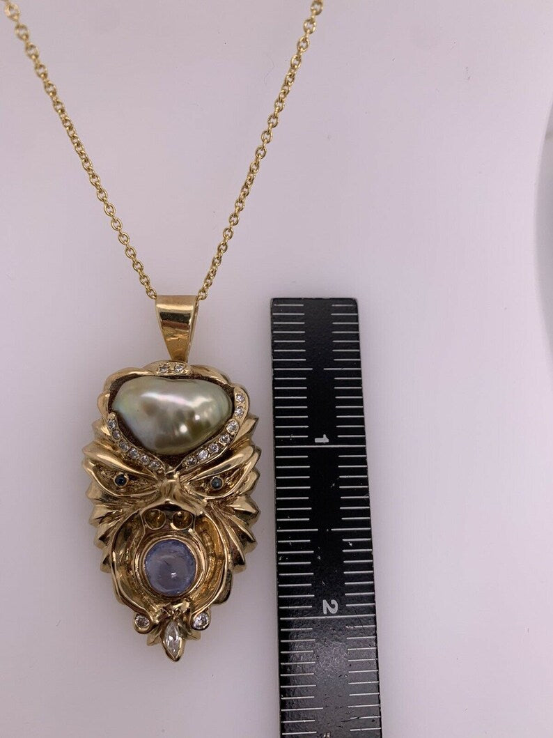 Retro Gold Warrior Head Natural Pearl, .30 Carat Diamond & Sapphire Pendant 1950