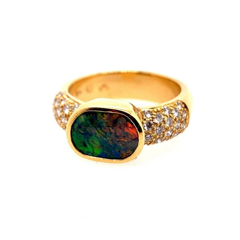 Retro Gold Natural 0.85 Carat Round Diamond and Opal Cocktail Ring Circa 1960