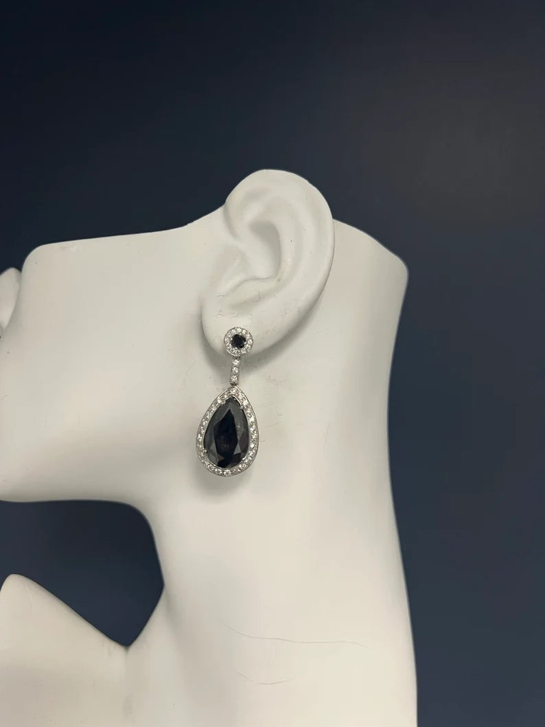 Modern Gold 23 Carat Natural Colorless and Black Pear Shaped Diamond Earrings