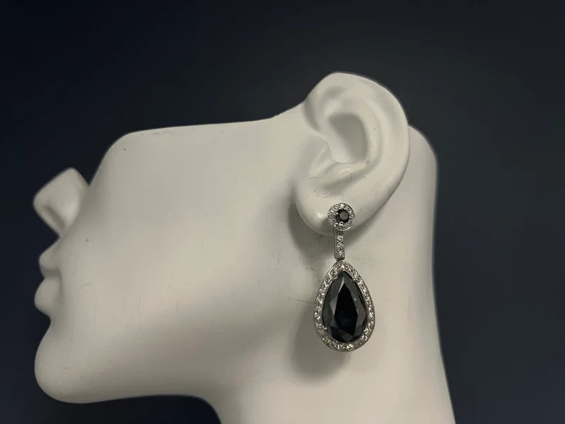 Modern Gold 23 Carat Natural Colorless and Black Pear Shaped Diamond Earrings