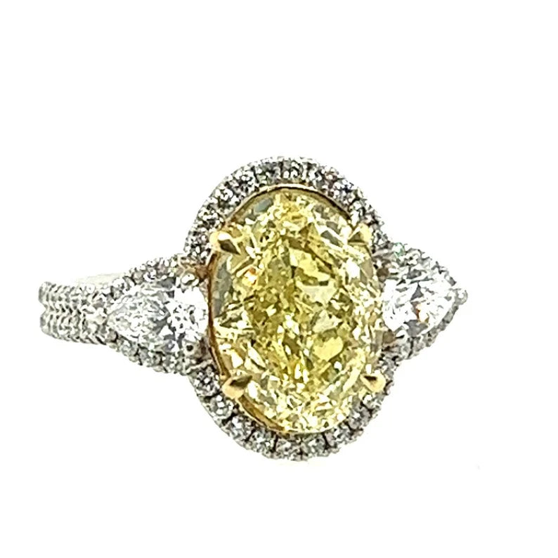 Platinum 3.16 CT Oval GIA Certified Natural Yellow VVS Diamond Engagement Ring