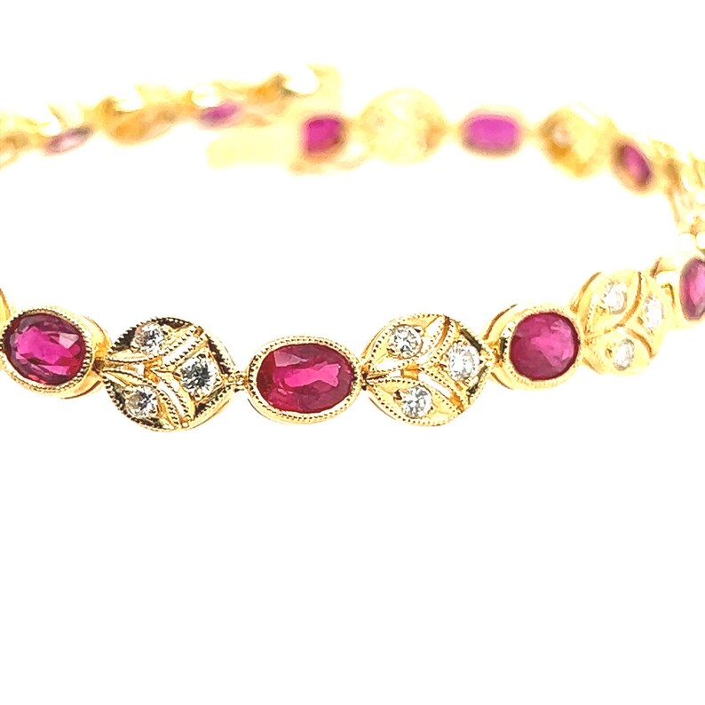 Retro Gold 5.46 Carat Natural Red Oval Ruby & Round Diamond Bracelet Circa 1980