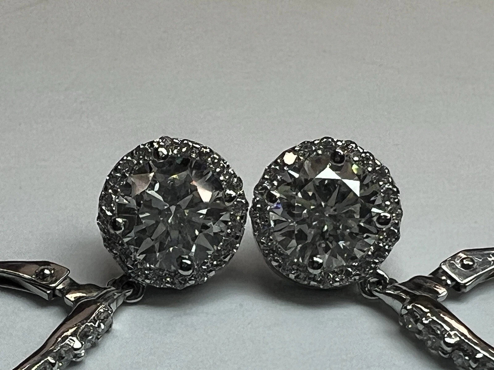 Modern Gold 2.7 Carat EGL USA Certified Natural Round Colorless Diamond Earrings