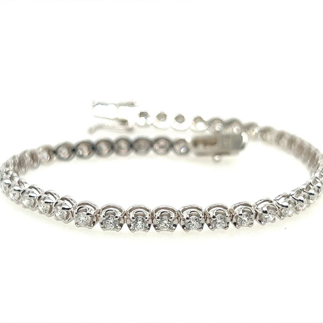 Modern Gold 2.42 Carat Natural Round Brilliant Colorless Diamond Tennis Bracelet