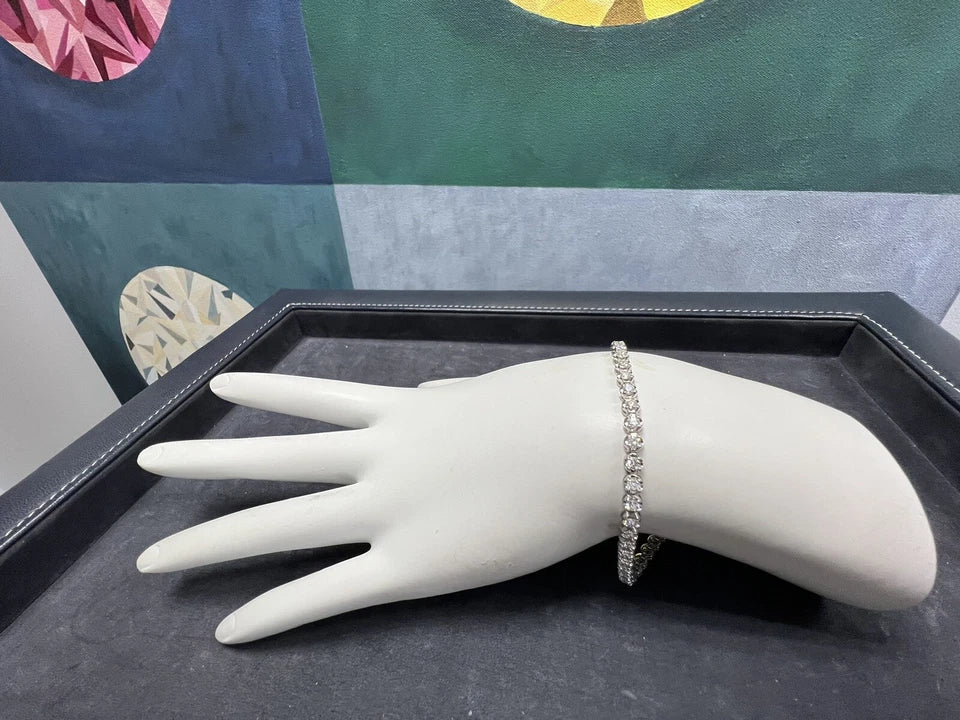 Modern Gold 2.42 Carat Natural Round Brilliant Colorless Diamond Tennis Bracelet
