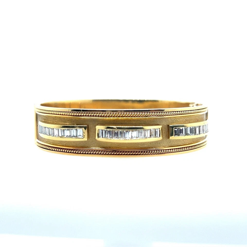 Retro Gold 2.50 Carat Natural Colorless Baguette Diamond Bangle Circa 1970