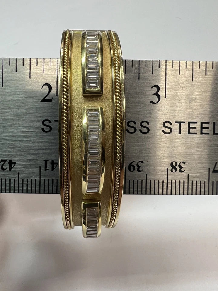 Retro Gold 2.50 Carat Natural Colorless Baguette Diamond Bangle Circa 1970