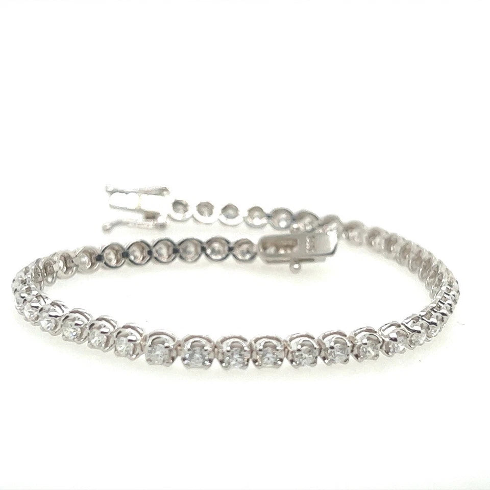 Modern Gold 2.42 Carat Natural Round Brilliant Colorless Diamond Tennis Bracelet