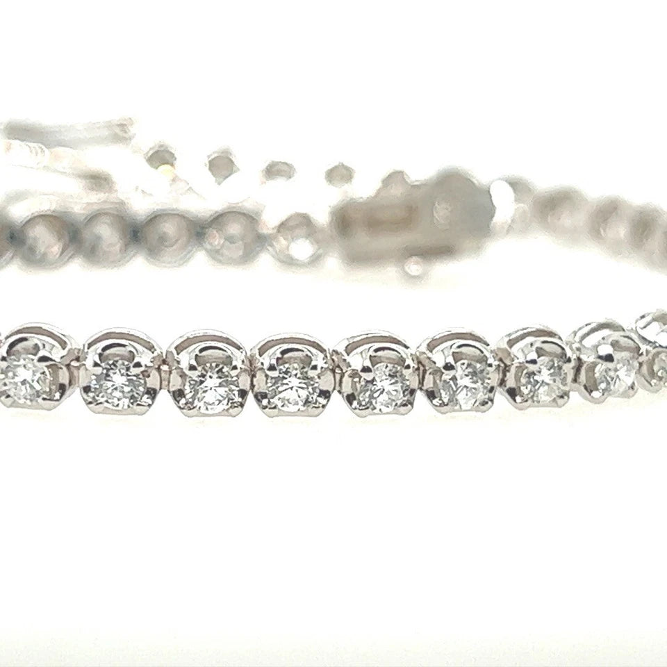 Modern Gold 2.42 Carat Natural Round Brilliant Colorless Diamond Tennis Bracelet