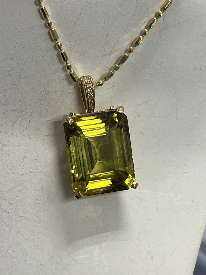 Retro GIA Certified 23.67 Carat Greenish Yellow Natural Chrysoberyl Gold Pendant