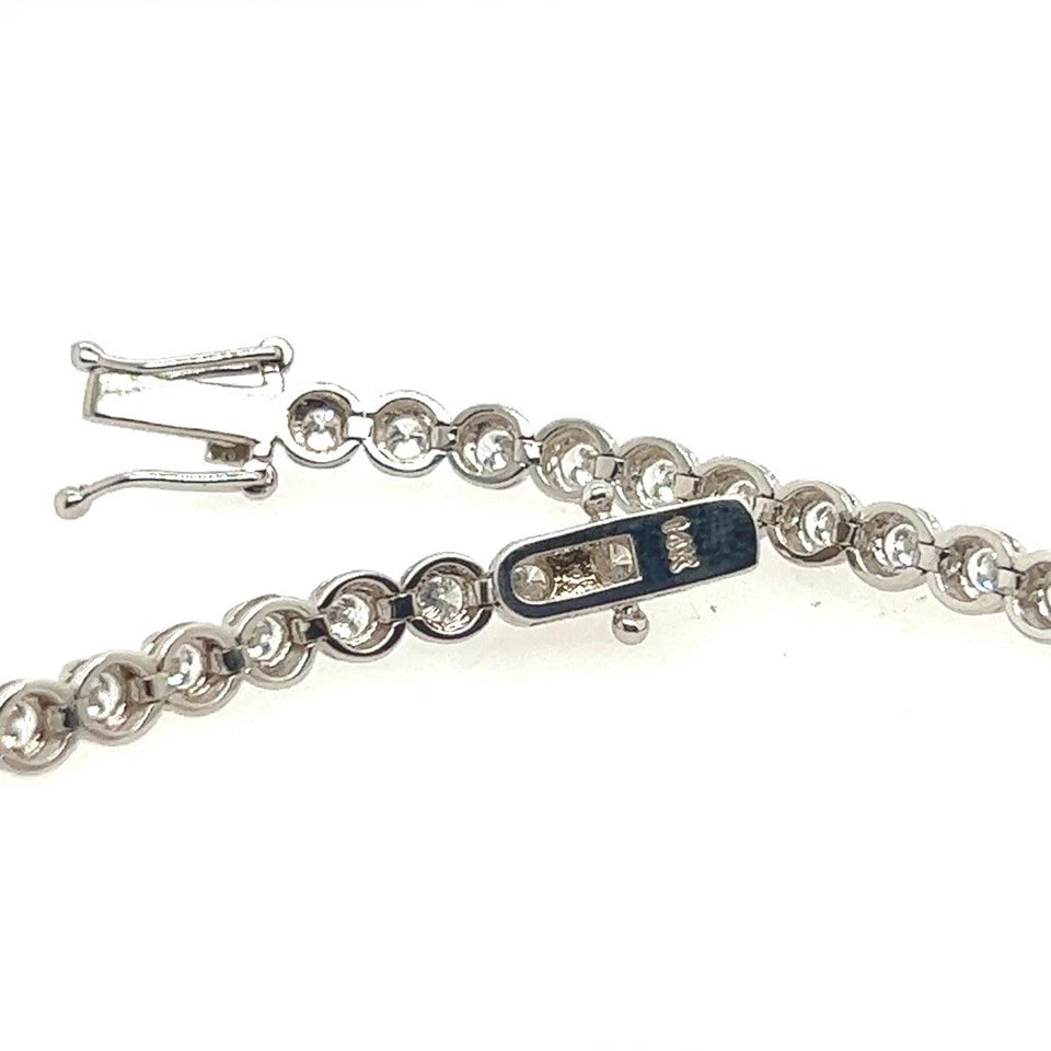Modern Gold 2.42 Carat Natural Round Brilliant Colorless Diamond Tennis Bracelet