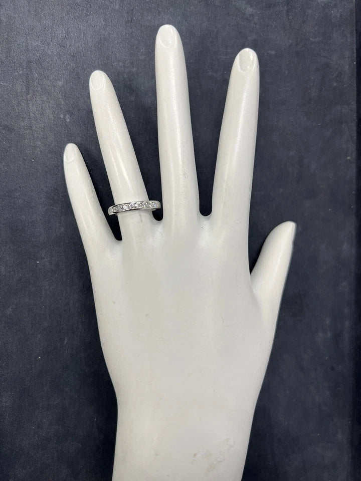Modern Tiffany & Co Natural .17 Carat Diamond Halfway Platinum Engagement Band
