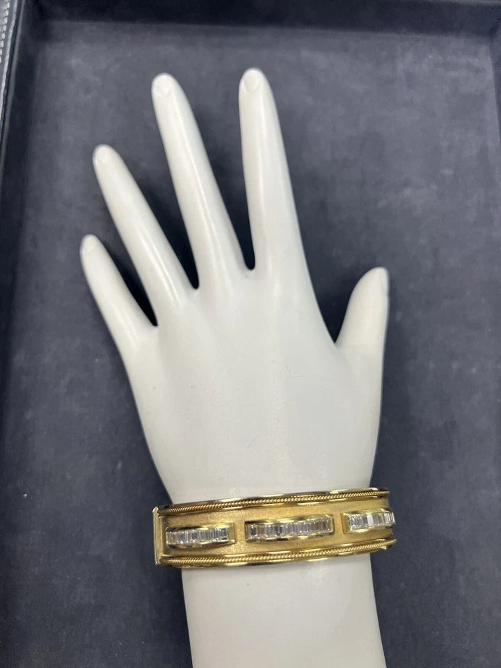 Retro Gold 2.50 Carat Natural Colorless Baguette Diamond Bangle Circa 1970