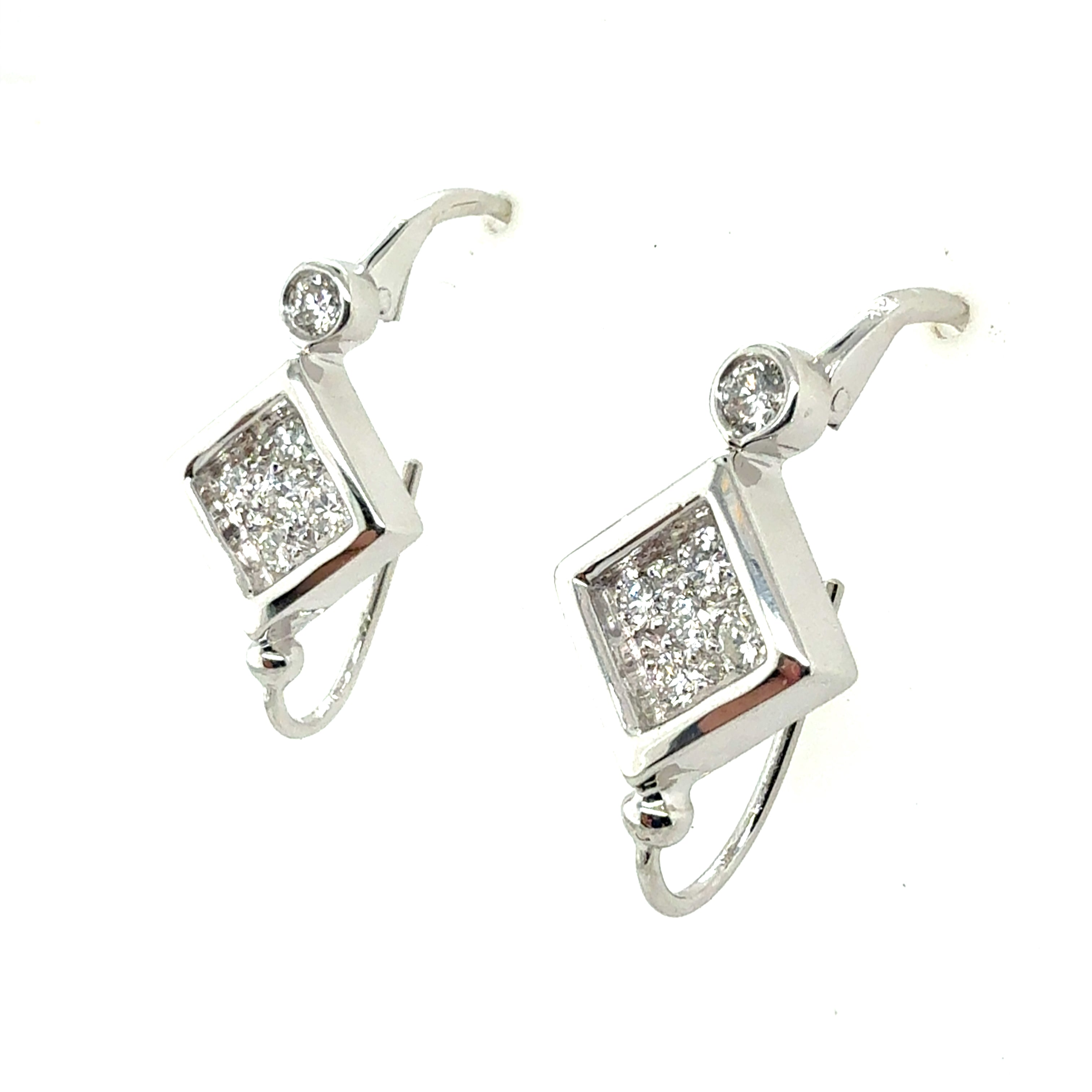 Retro White Gold 0.6 Carat Natural Colorless Diamond Earrings, Circa 1980