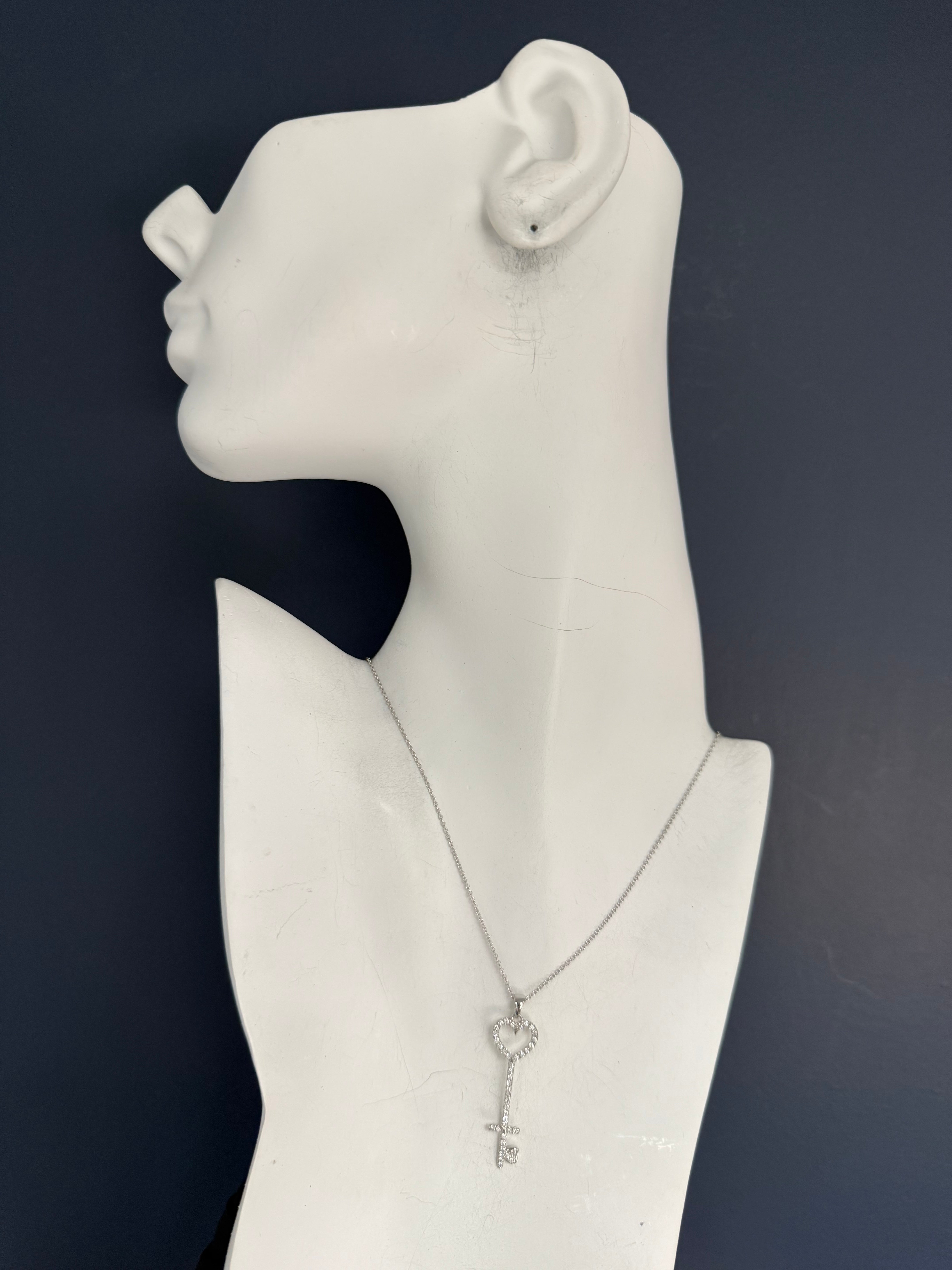 Modern White Gold 0.75 CARAT Natural Round Brilliant Diamond Key Shaped Pendant