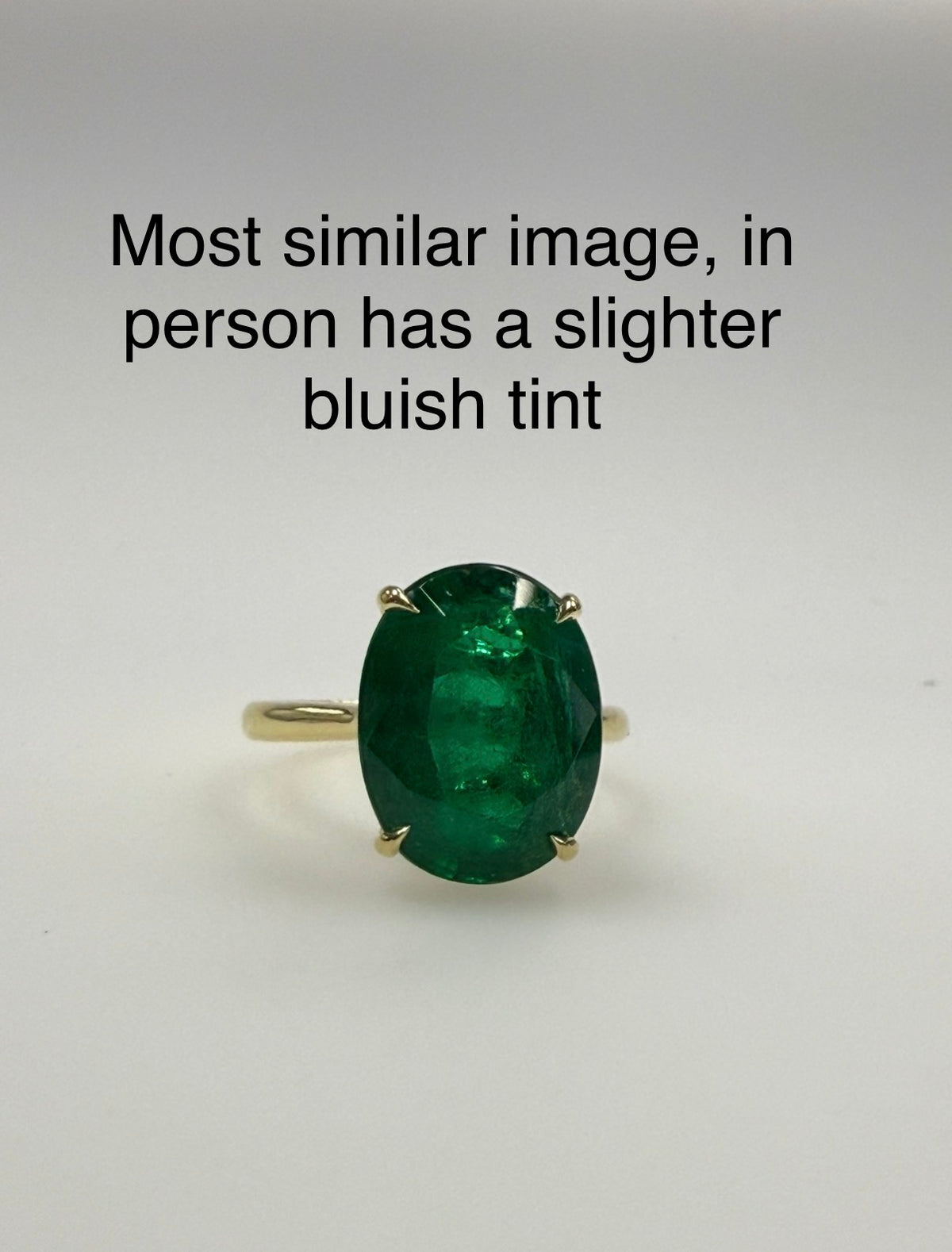 Modern Gold GIA Certified 6.53 Carat Natural Oval Zambian Green Emerald Ring