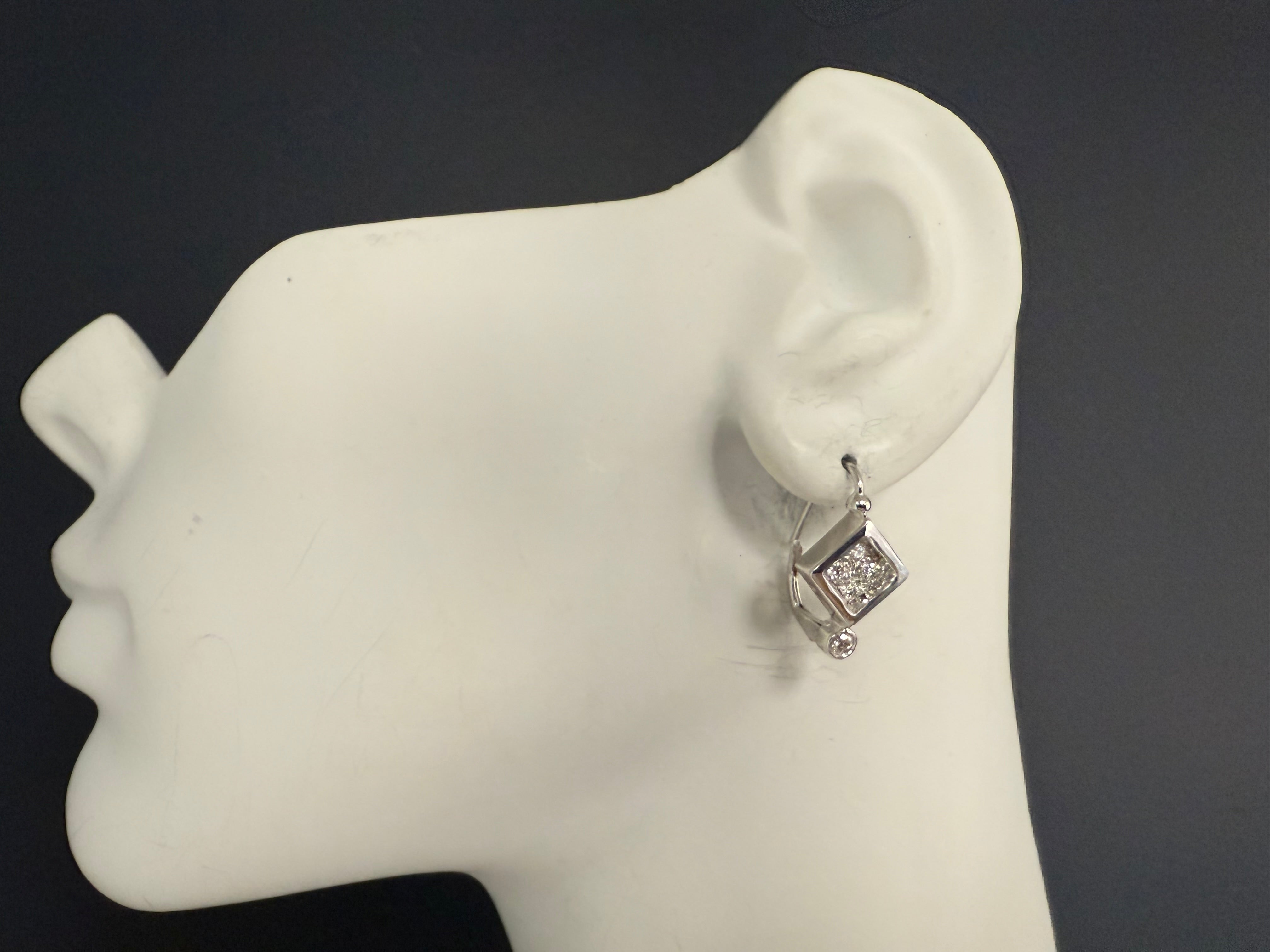 Retro White Gold 0.6 Carat Natural Colorless Diamond Earrings, Circa 1980