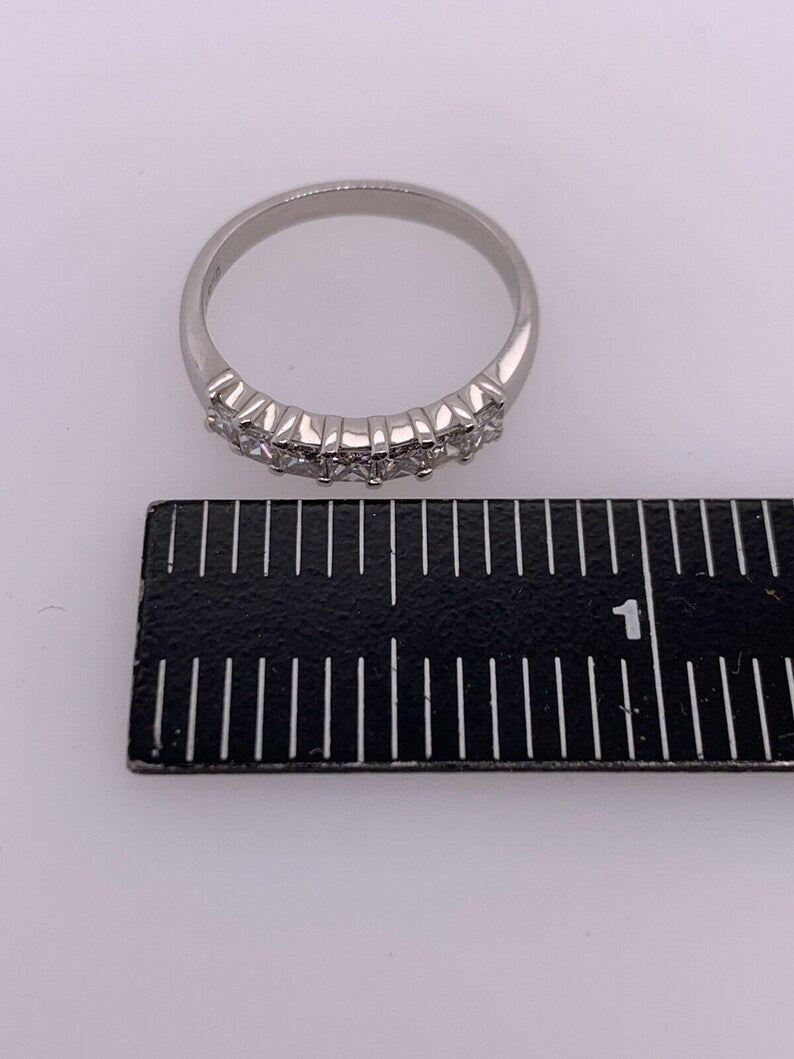 Modern Platinum Band 0.95 Carat Natural Colorless Princess Cut Diamond Band