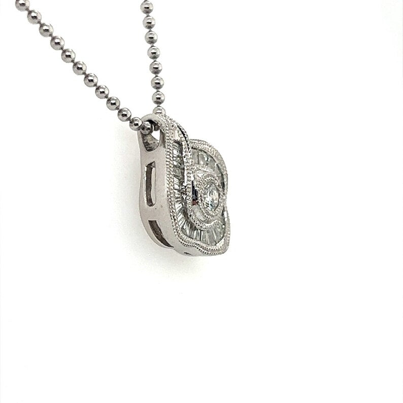 Modern Platinum 0.75 Carat Natural Round & Baguette Diamond Pendant Necklace