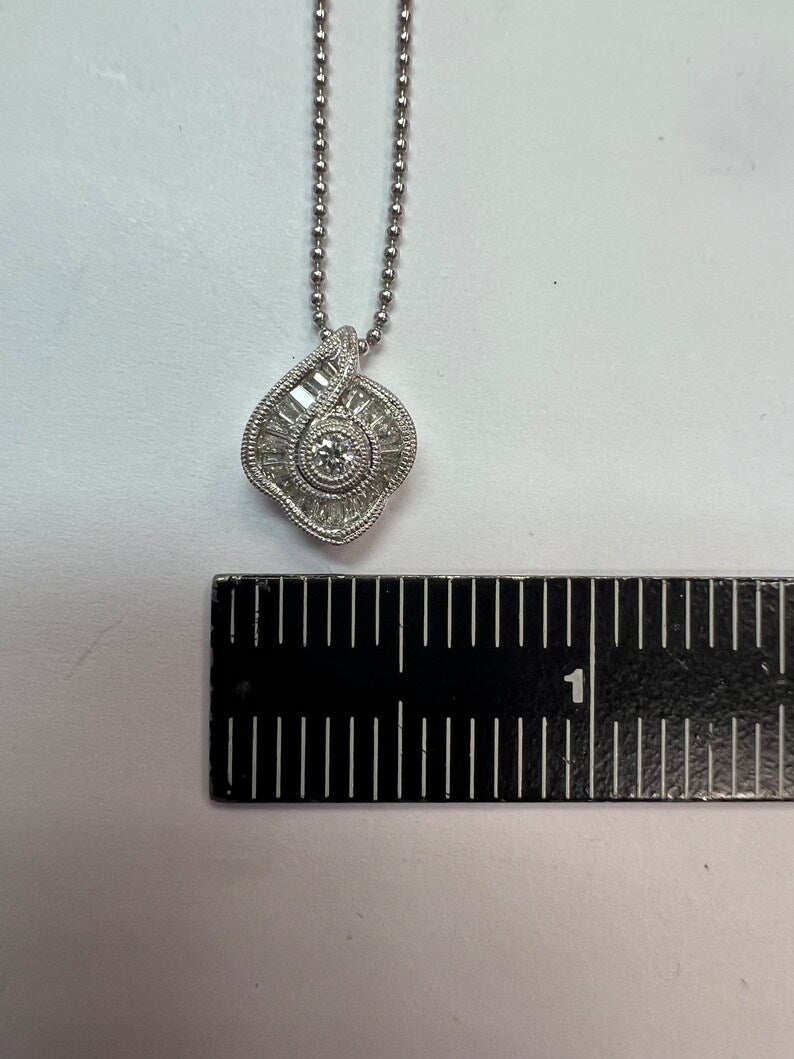 Modern Platinum 0.75 Carat Natural Round & Baguette Diamond Pendant Necklace