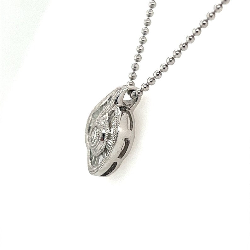 Modern Platinum 0.75 Carat Natural Round & Baguette Diamond Pendant Necklace