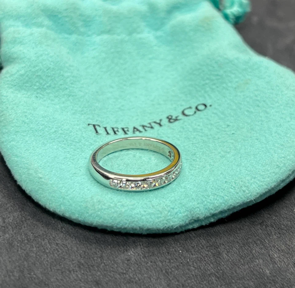 Modern Tiffany & Co Natural .17 Carat Diamond Halfway Platinum Engagement Band